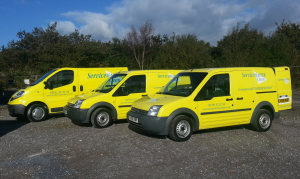 A few vans from the fleet of Servicemaster Commercial Cleaning